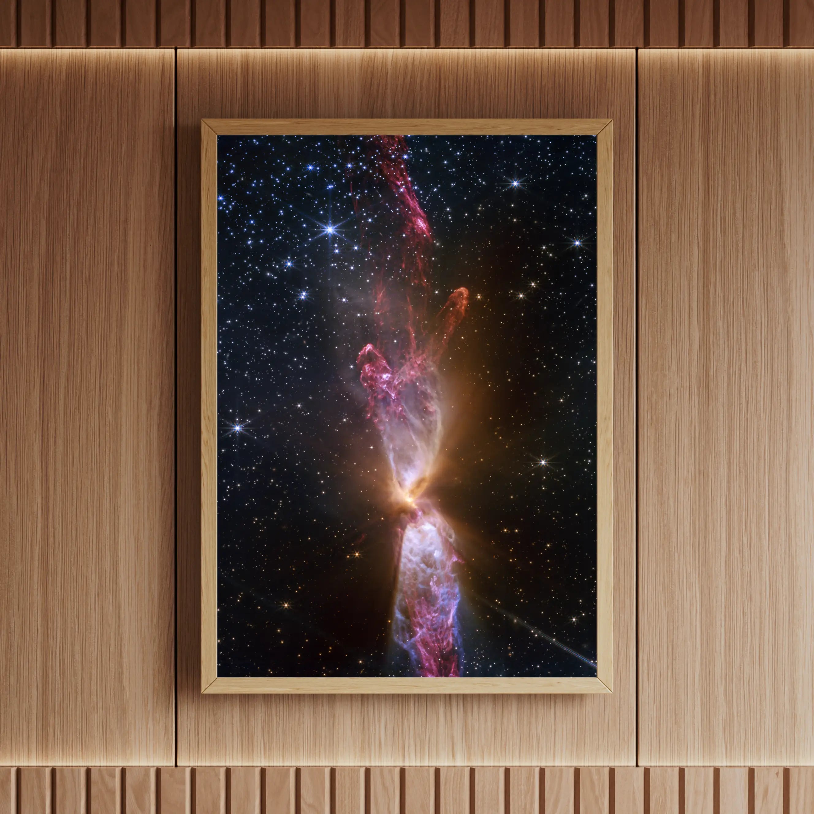 High-resolution astronomy print of Lynds 483 showcasing stellar formation jets and dark nebula detail, framed in natural wood – part of Skylit Studio’s Deep Sky Collection.