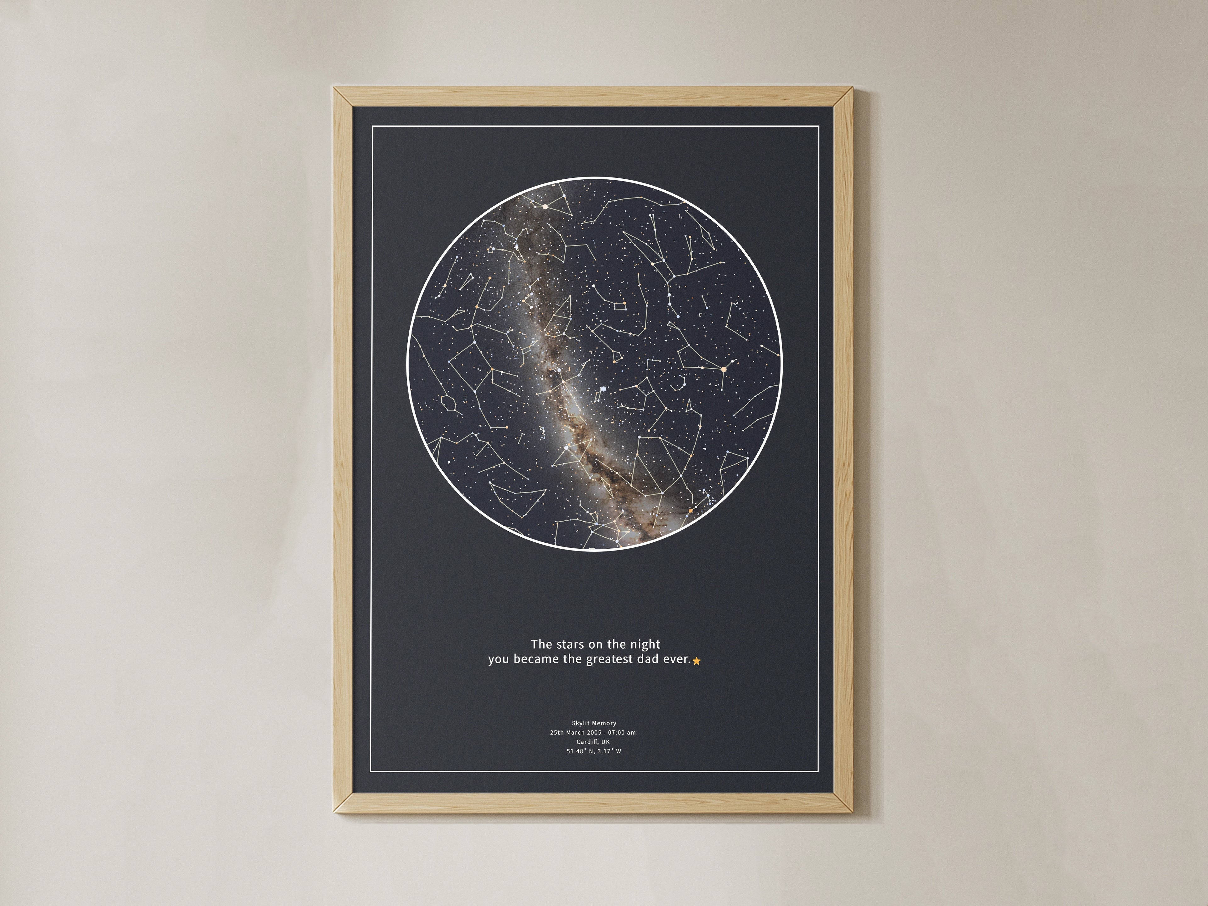 Framed personalised star map print with constellation lines and Milky Way detail on a deep navy background, featuring the quote ‘The stars on the night you became the greatest dad ever’, displayed on a beige wall – custom gift by Skylit Studio.
