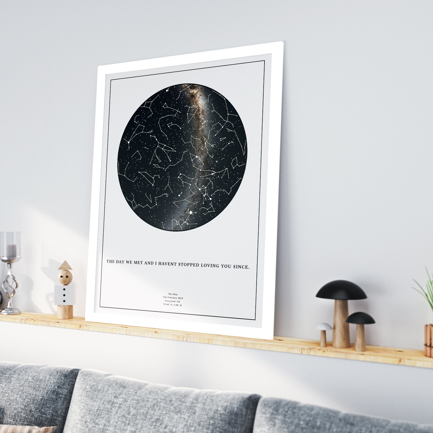 Personalized framed star map print in an elegant white engineered wood frame, featuring a custom night sky constellation design and the romantic quote &
