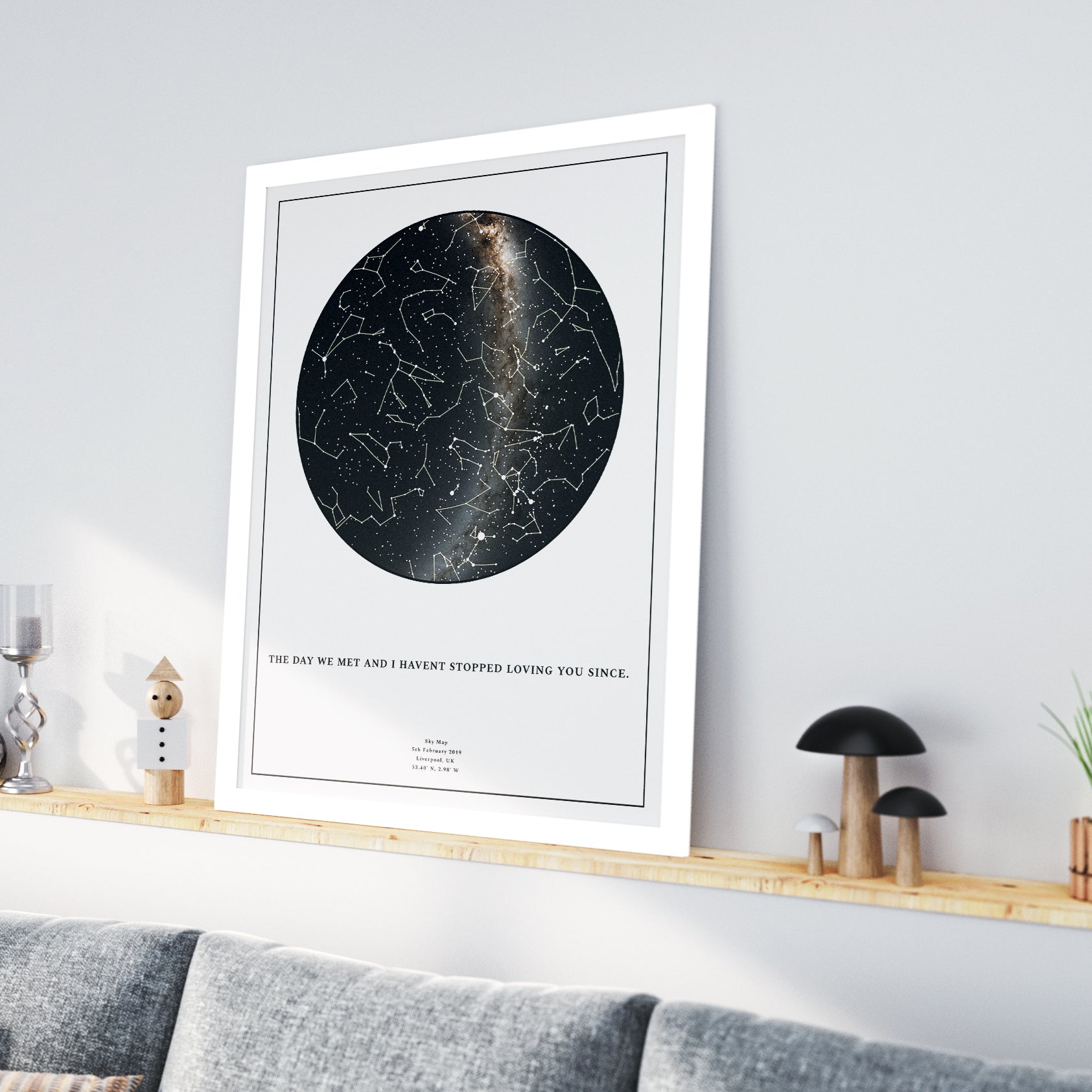 Personalized framed star map print in an elegant white engineered wood frame, featuring a custom night sky constellation design and the romantic quote &