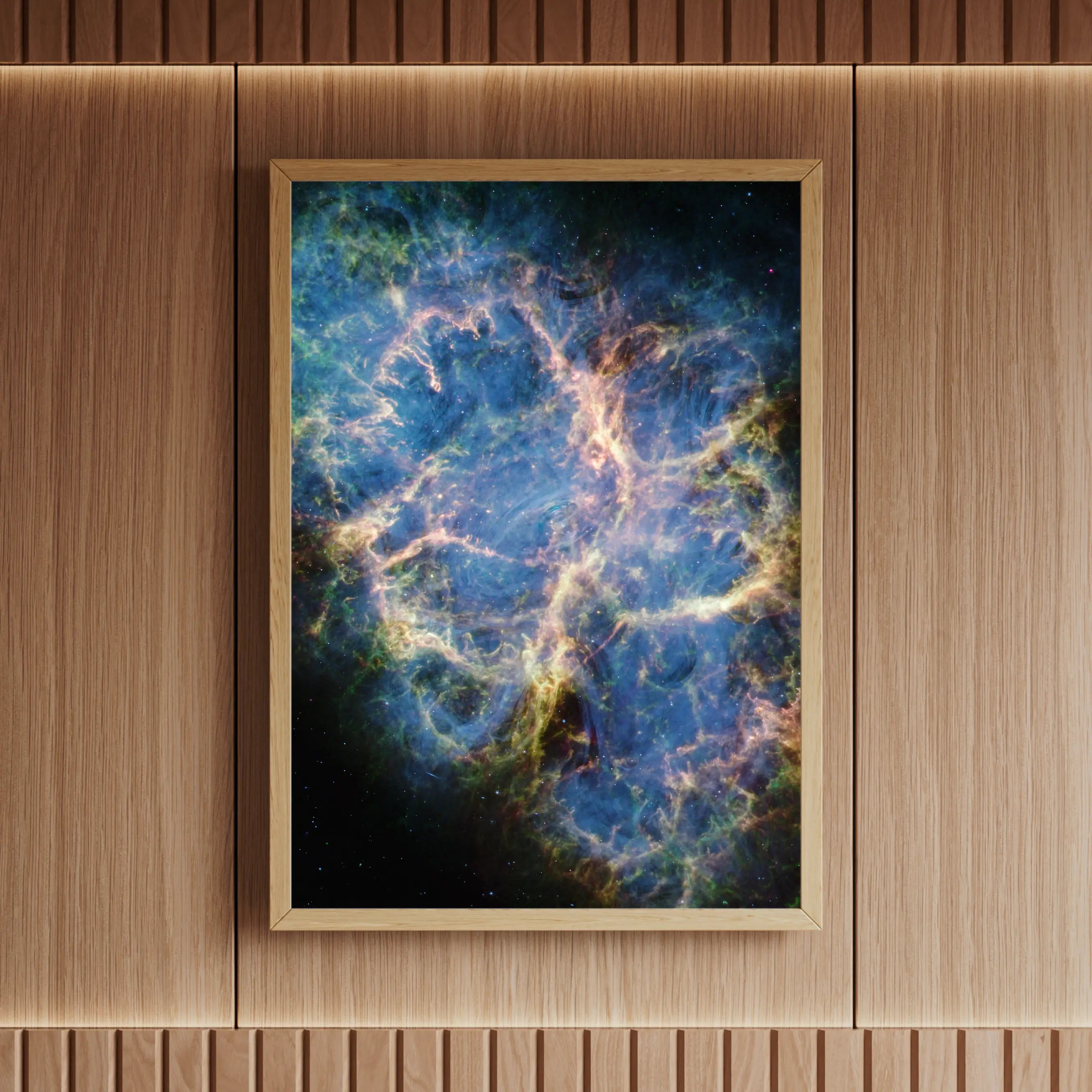 High-resolution Crab Nebula print captured by space telescopes, showing supernova remnants in stunning cosmic detail, framed in natural oak – part of Skylit Studio’s Deep Sky Collection.