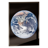 The Blue Marble print in a classic black frame