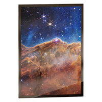 Cosmic Cliffs print in a classic black frame