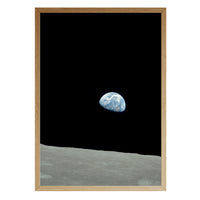 Earthrise print in a natural brown wood frame