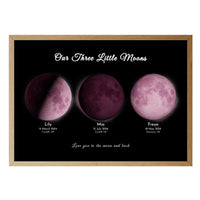 Three pink moons family print in a natural brown frame