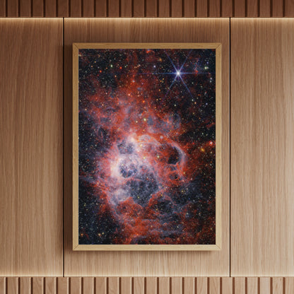 High-resolution nebula print of NGC 604 with vivid starfield and emission clouds, professionally framed and showcased in a modern wood-panelled space – from Skylit Studio’s astronomy print series.