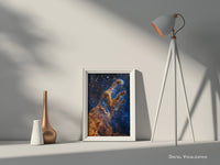 James Webb Space Telescope image of the Pillars of Creation framed as a fine art print, showcasing stellar nurseries and interstellar gas clouds in the Eagle Nebula.