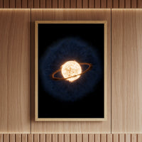 Modern framed print of a glowing celestial body with ringed features and a dramatic dark backdrop, ideal for space-themed interiors – from Skylit Studio.