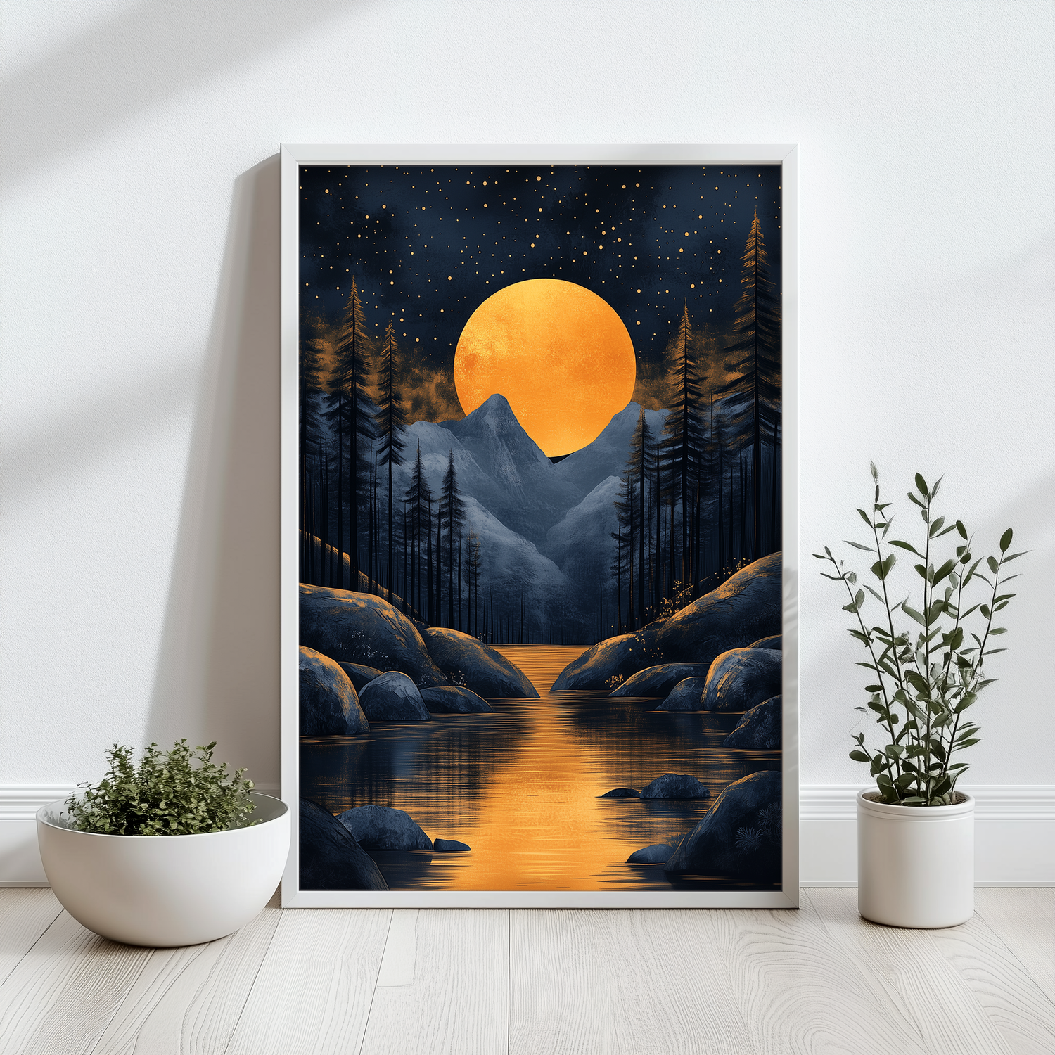 A serene artwork by Skylit Studio displayed in a room, featuring a large golden moon casting a warm glow over a mystical landscape of dark pine forests, sharp mountain peaks, and a reflective river running through a rocky terrain, all under a starlit sky. Two potted plants, one with lush green foliage and the other taller and leafy, are positioned beside the artwork, enhancing the naturalistic theme of the scene.