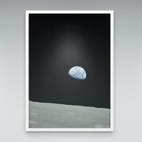Earthrise print in an elegant white frame