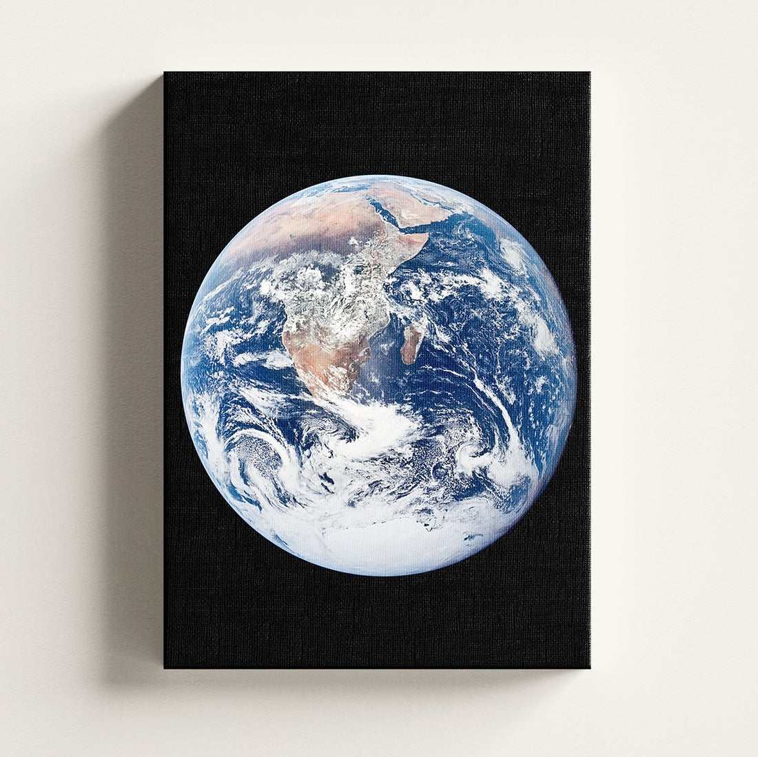 The Blue Marble print on a stretched canvas, Skylit Studio