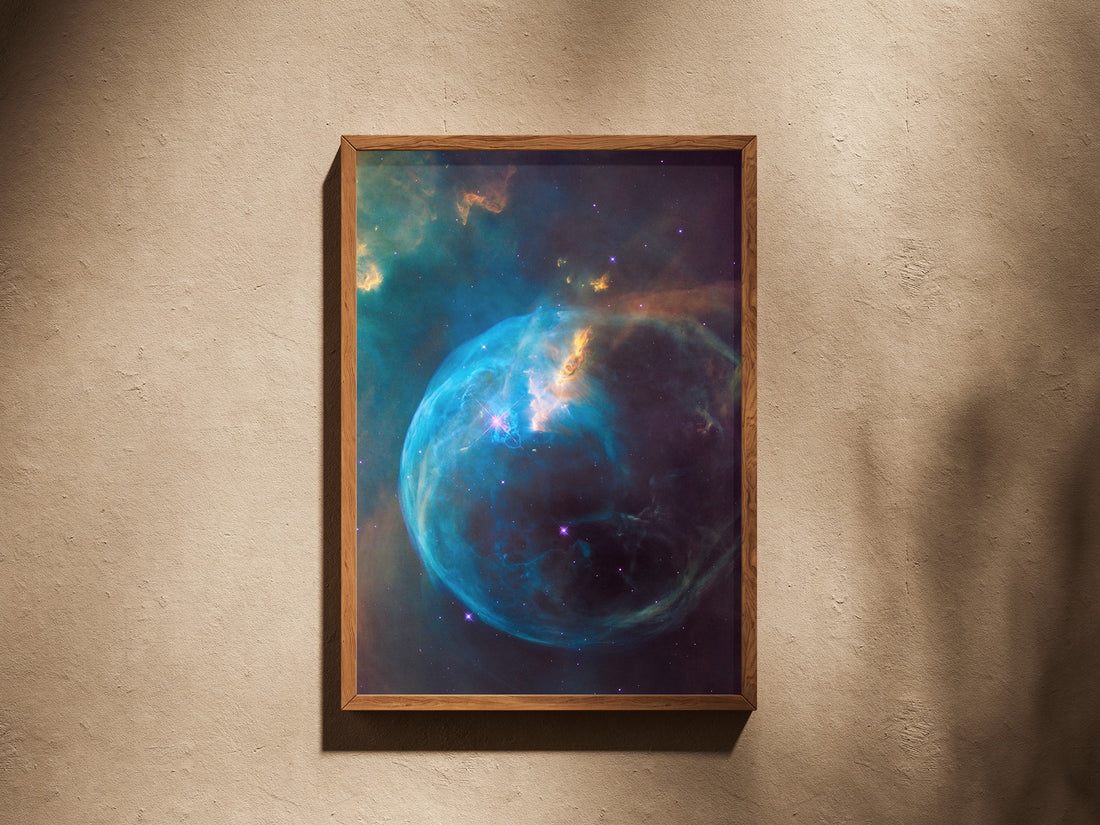 Bubble Nebula print in a wooden frame on a plaster wall
