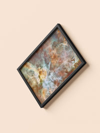 Carina Nebula panorama print in a black frame, flat lay