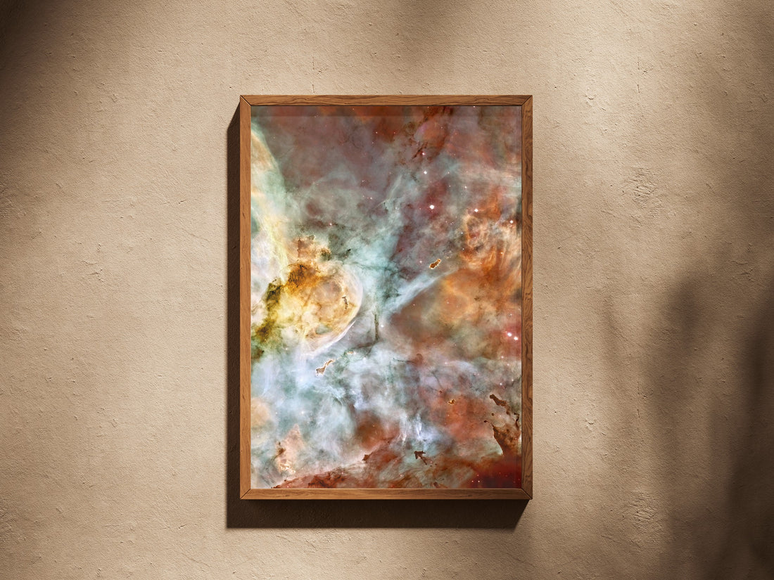 Carina Nebula print in a wooden frame on a plaster wall