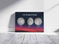 Family moon phase print on a stretched canvas, hung on a white wall