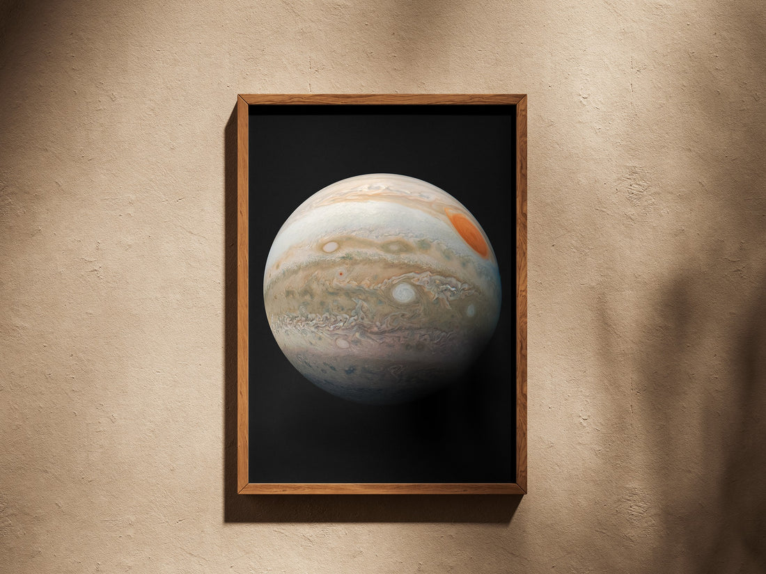 Jupiter print in a wooden frame on a plaster wall