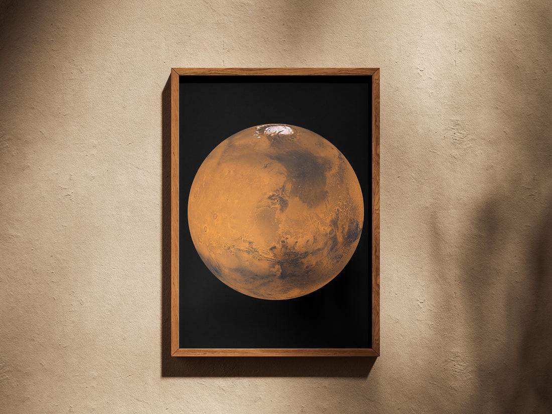 Mars print in a wooden frame on a plaster wall