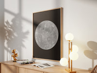 Framed Mercury print by Skylit Studio on a sideboard in a bright living room