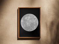 Mercury print in a wooden frame on a plaster wall