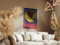 Personalised moon map print in a natural frame above a sofa