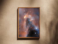 NGC 1333 Perseus print in a wooden frame on a plaster wall