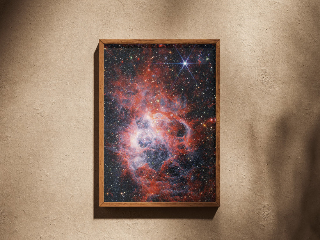 NGC 604 print in a wooden frame on a plaster wall