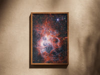 NGC 604 print in a wooden frame on a plaster wall