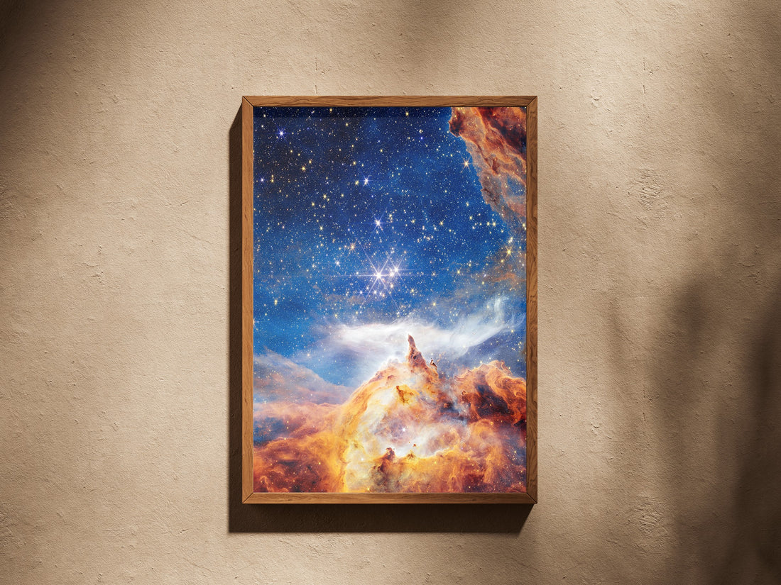 Pismis 24 print in a wooden frame on a plaster wall