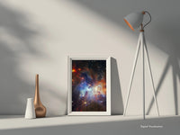 High-resolution framed print of the Serpens star-forming region with radiant nebula colours and starburst detail, styled in a modern room setting – astronomy print by Skylit Studio.