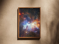 Serpens Nebula print in a wooden frame on a plaster wall