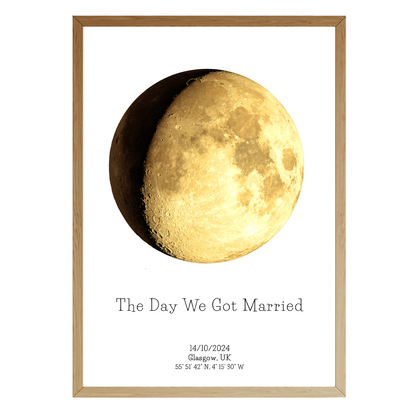 Minimalist moon phase artwork with wedding date, location, and coordinates in a clean oak frame – astronomy-inspired art by Skylit Studio.
