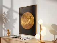 Framed Venus print by Skylit Studio on a sideboard in a bright living room