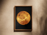 Venus print in a wooden frame on a plaster wall