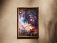 Westerlund 2 print in a wooden frame on a plaster wall