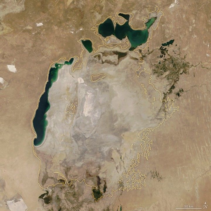 The Aral Sea in 2014, almost drained