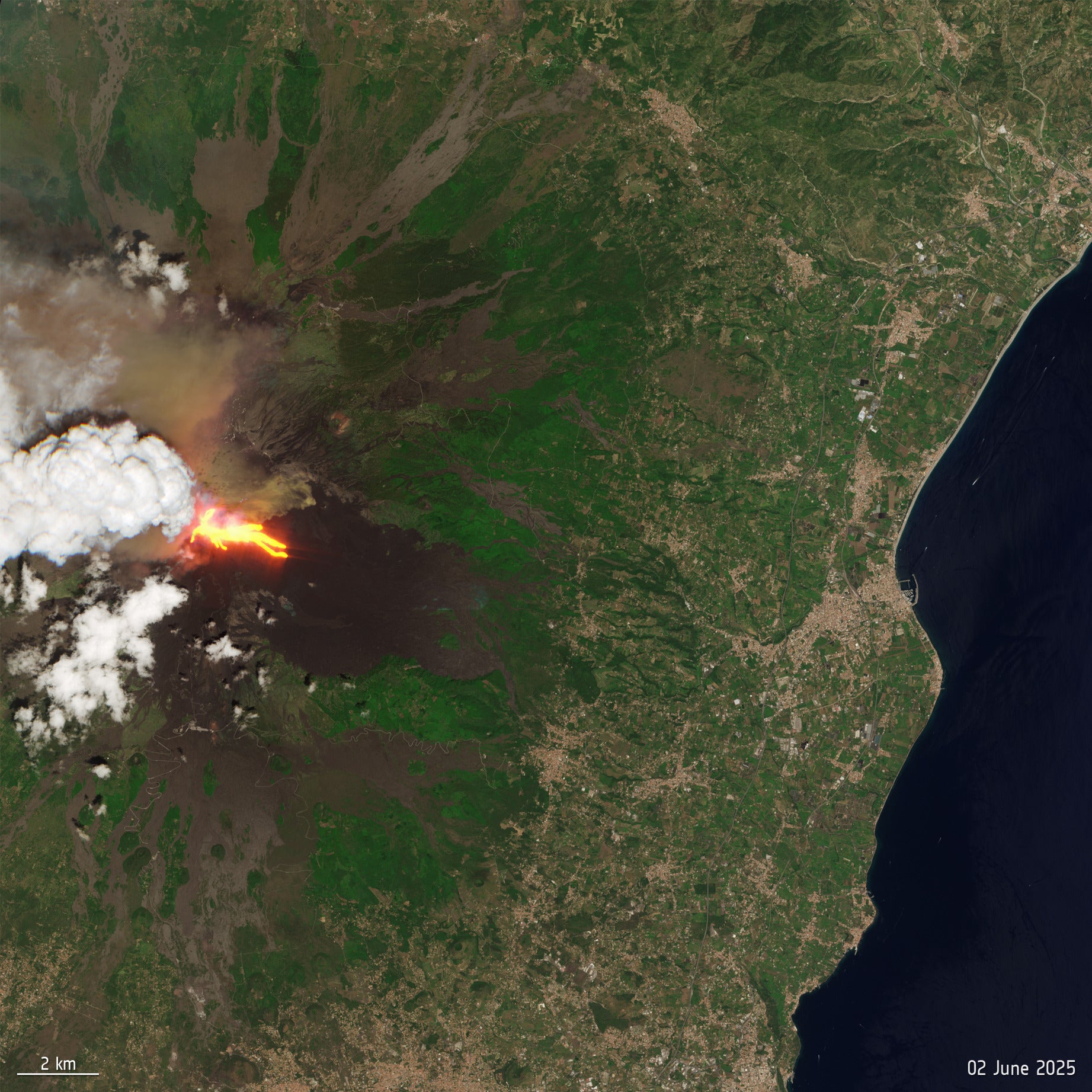 Mount Etna erupting on 2 June 2025, photographed by Sentinel-2, with an ash plume drifting from the southeast crater